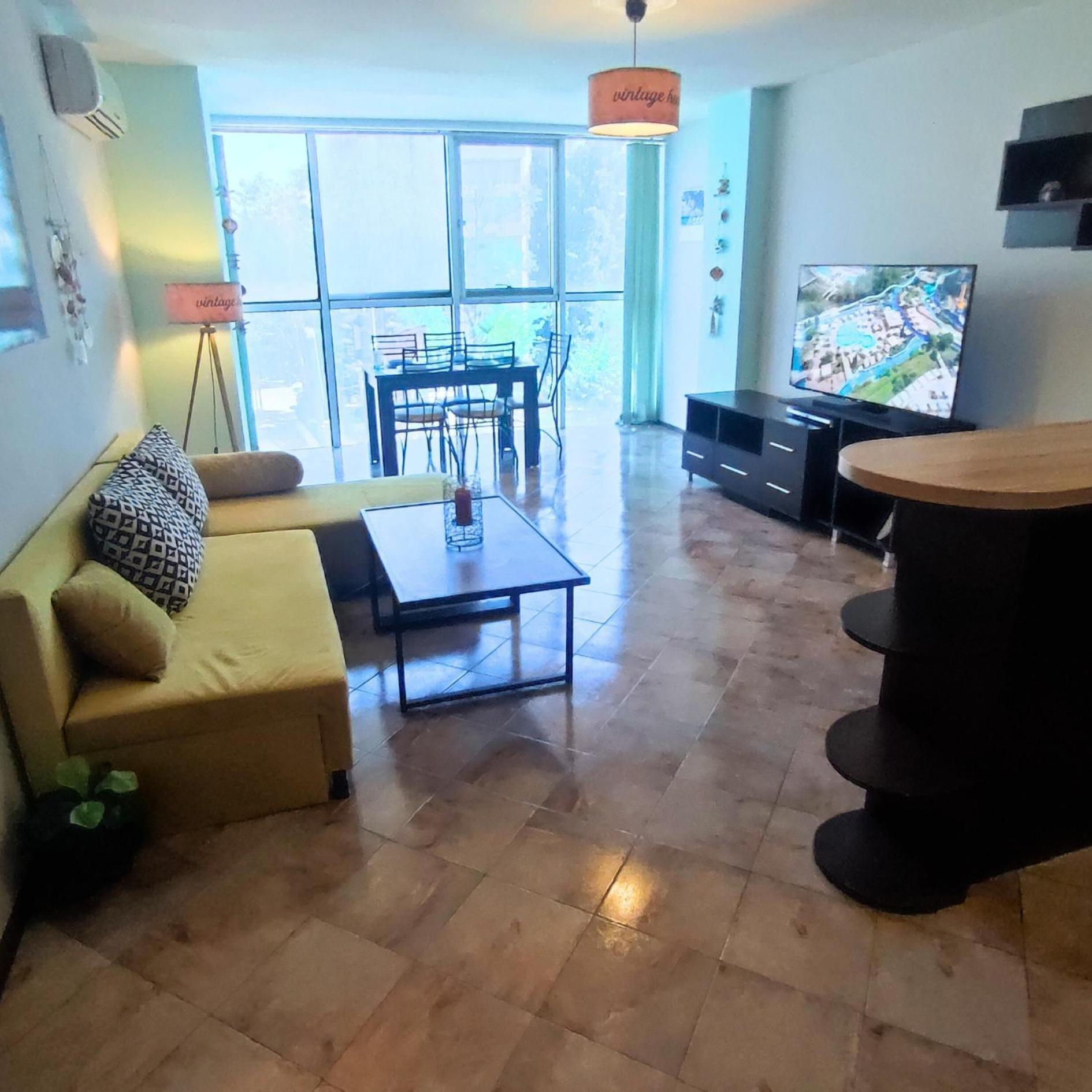 Апартамент Flame Pantai Sunny Bagian luar foto